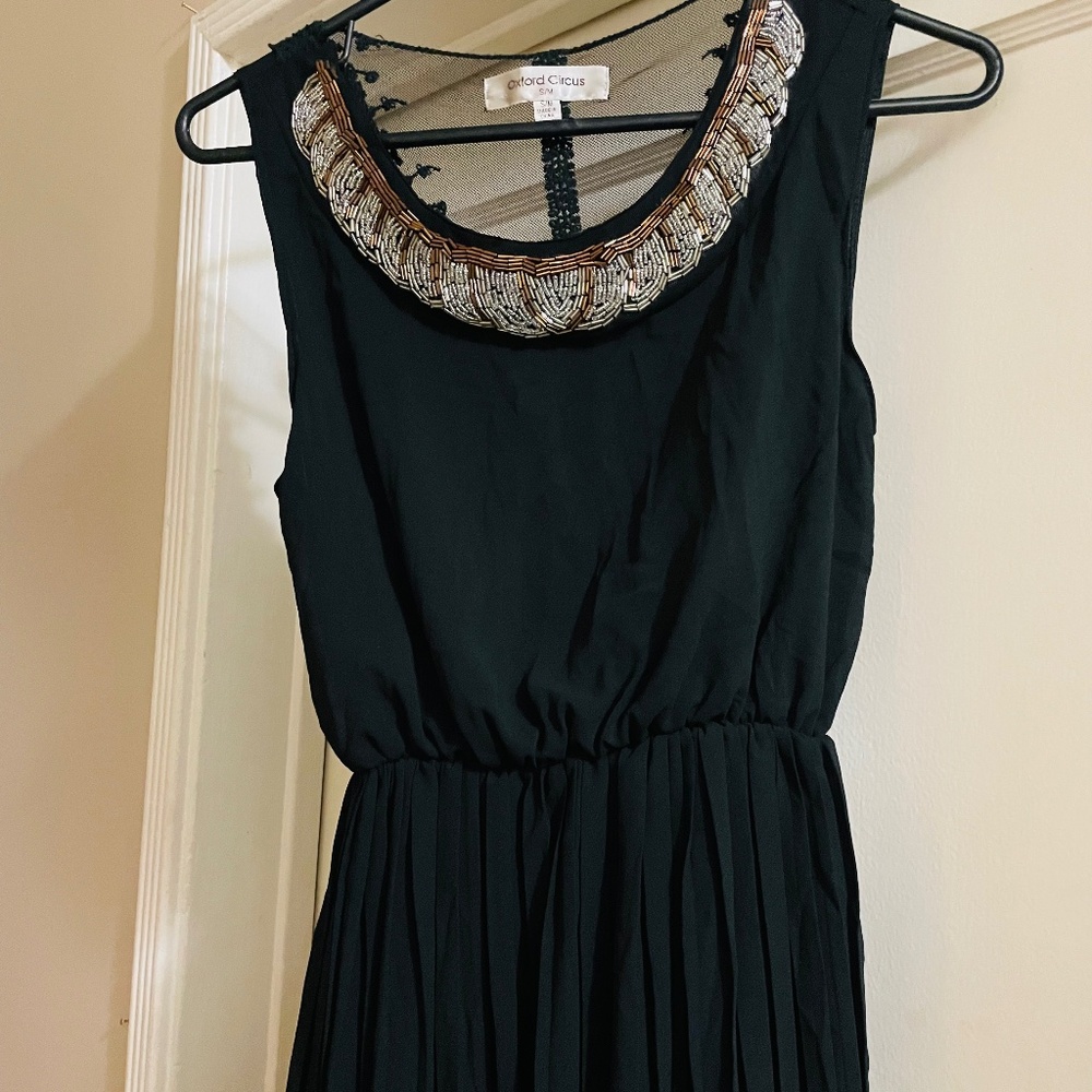Sleeveless Black Midi Dress with Beaded Neckline